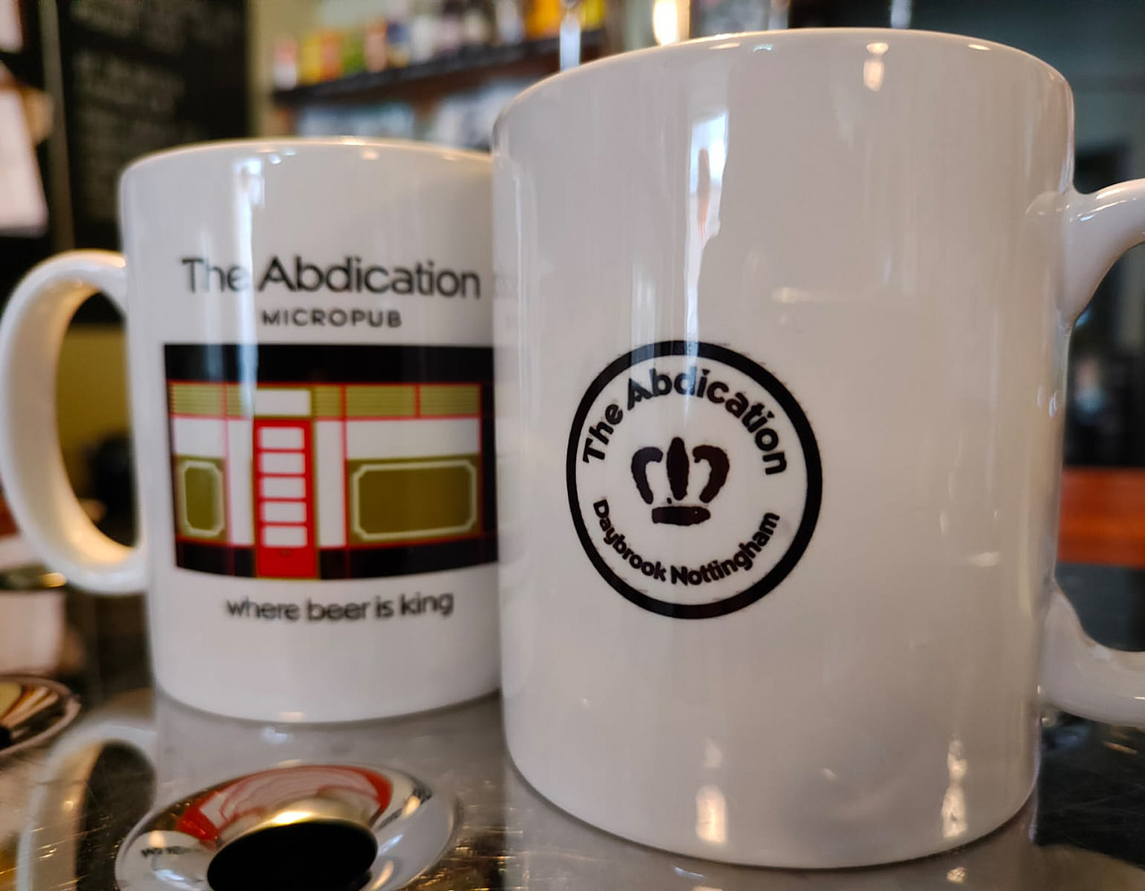 Abdication Mug - Merchandise for sale in the pub